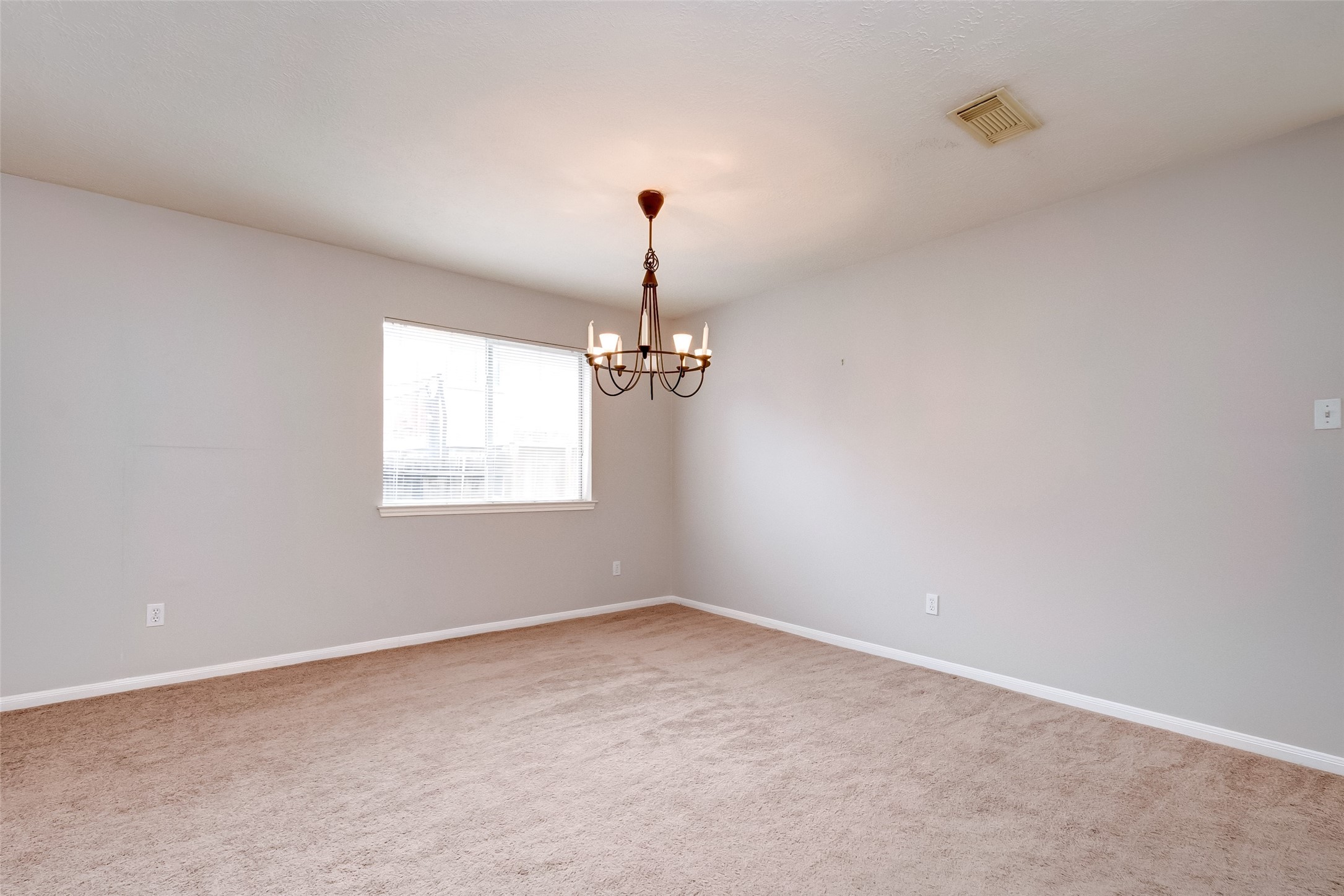 12654 Pine Bush Drive Houston, TX 77070 - Photo 16 of 35 wooden floor in an empty room with a window