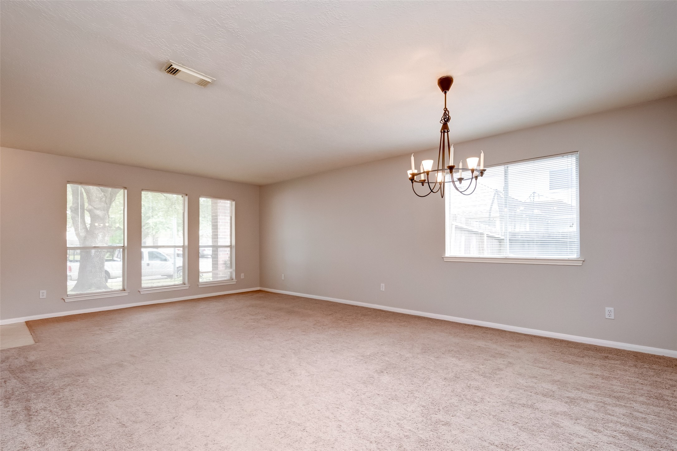 12654 Pine Bush Drive Houston, TX 77070 - Photo 17 of 35 a view of an empty room with a window