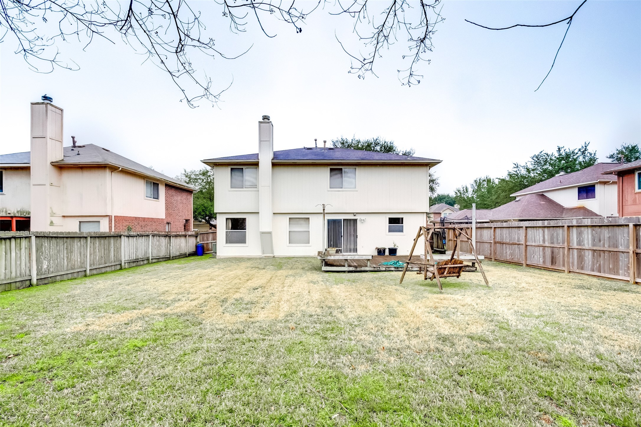 12654 Pine Bush Drive Houston, TX 77070 - Photo 33 of 35 a view of a house with patio and a yard