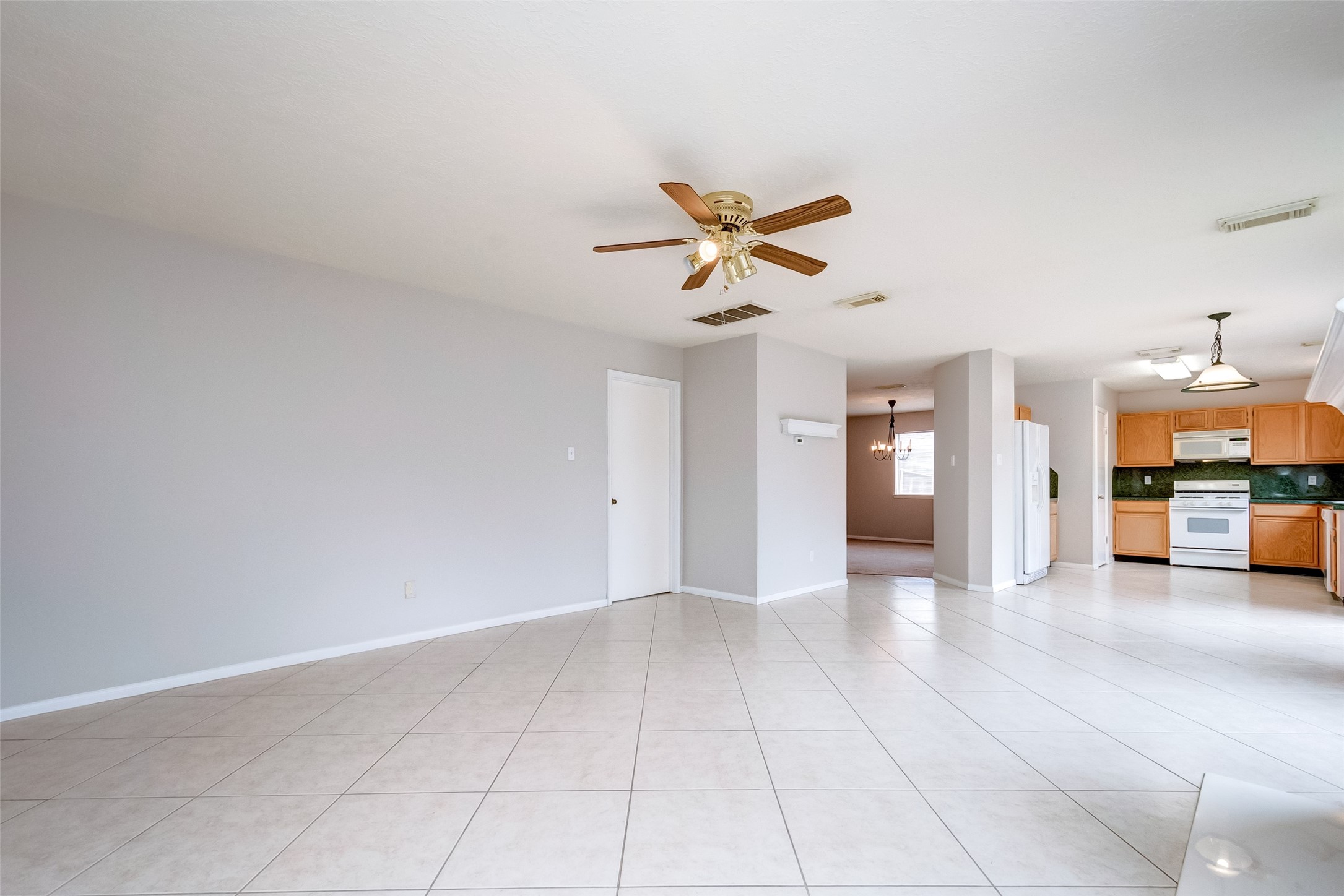 12654 Pine Bush Drive Houston, TX 77070 - Photo 4 of 35 a view of a livingroom with a fireplace