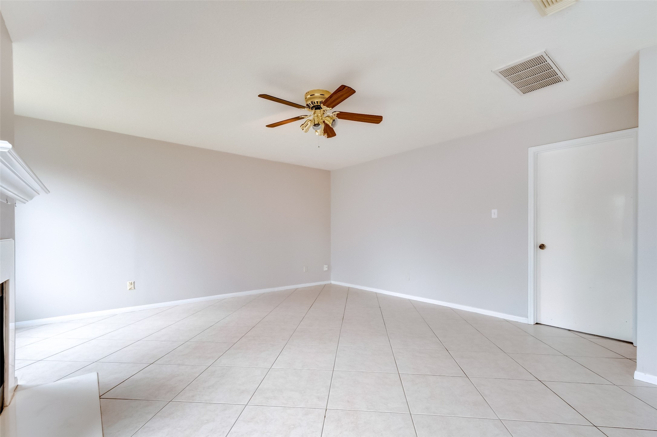 12654 Pine Bush Drive Houston, TX 77070 - Photo 5 of 35 wooden floor in an empty room with a window