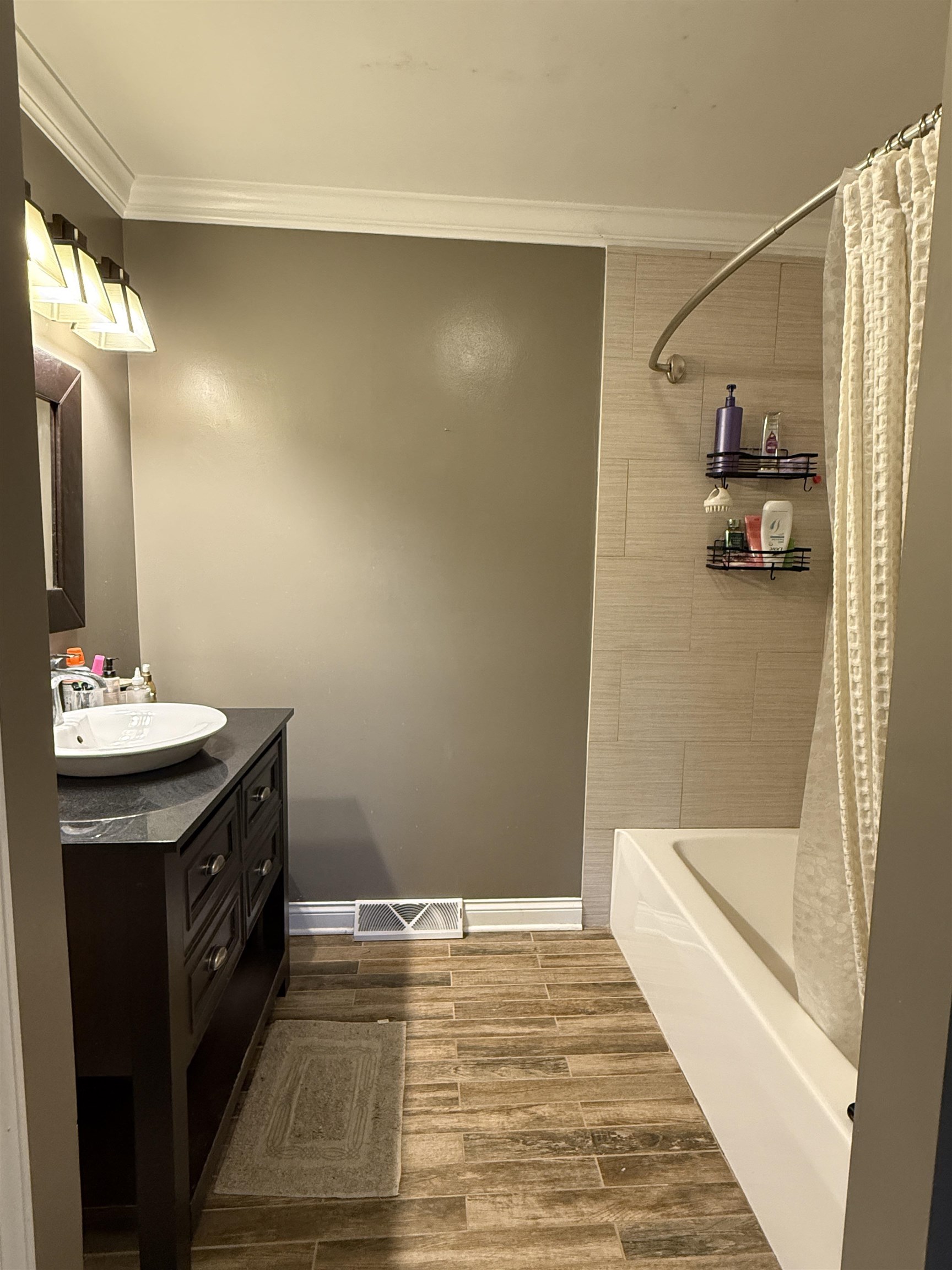 402 West Le Fevre Road Sterling, IL 61081 - Photo 25 of 39 a bathroom with a sink and a mirror