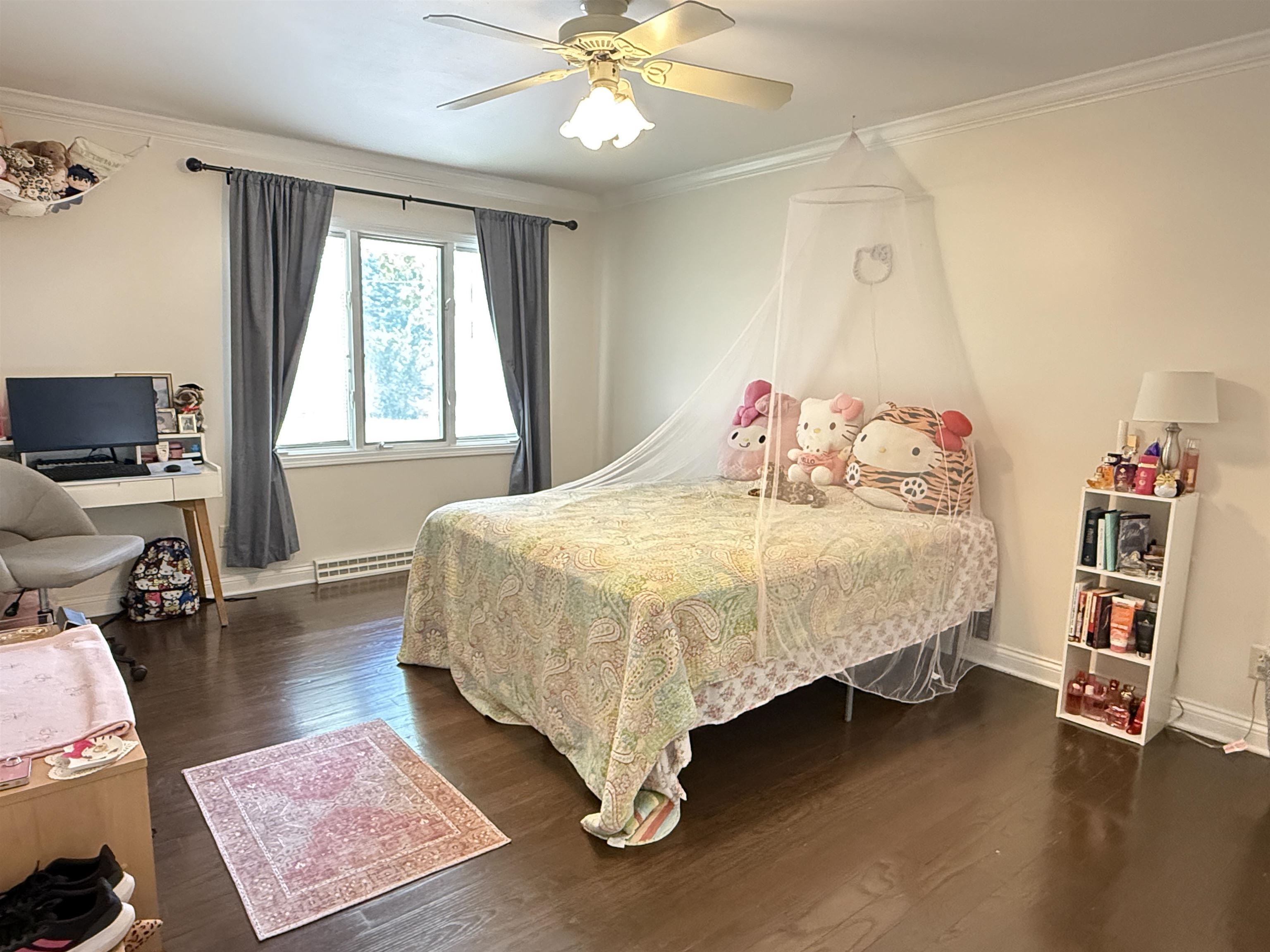 402 West Le Fevre Road Sterling, IL 61081 - Photo 27 of 39 a bedroom with a bed and a chandelier