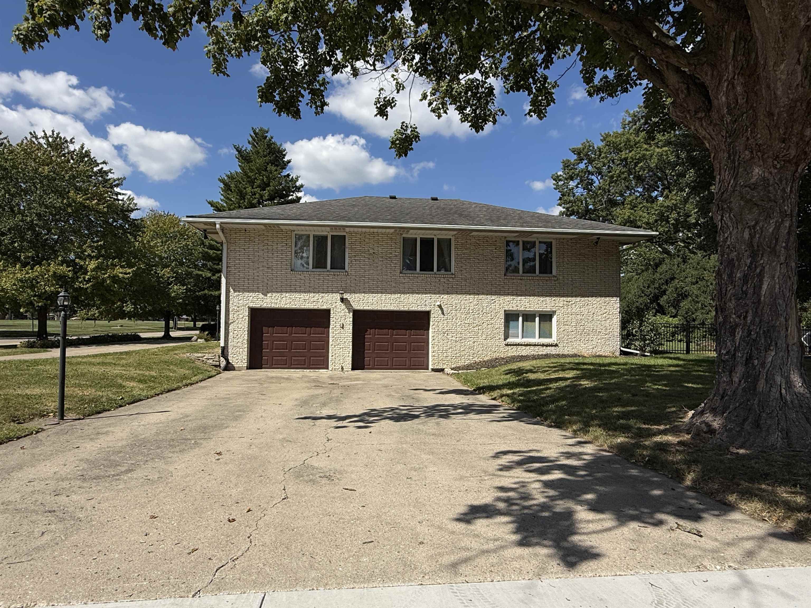 402 West Le Fevre Road Sterling, IL 61081 - Photo 35 of 39 a front view of house with yard and trees