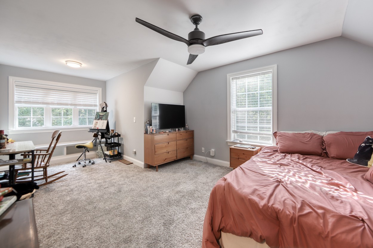 65 Sheltontown Road Manchester, TN 37355 - Photo 25 of 46 a bedroom with a bed a flat screen tv and a couch