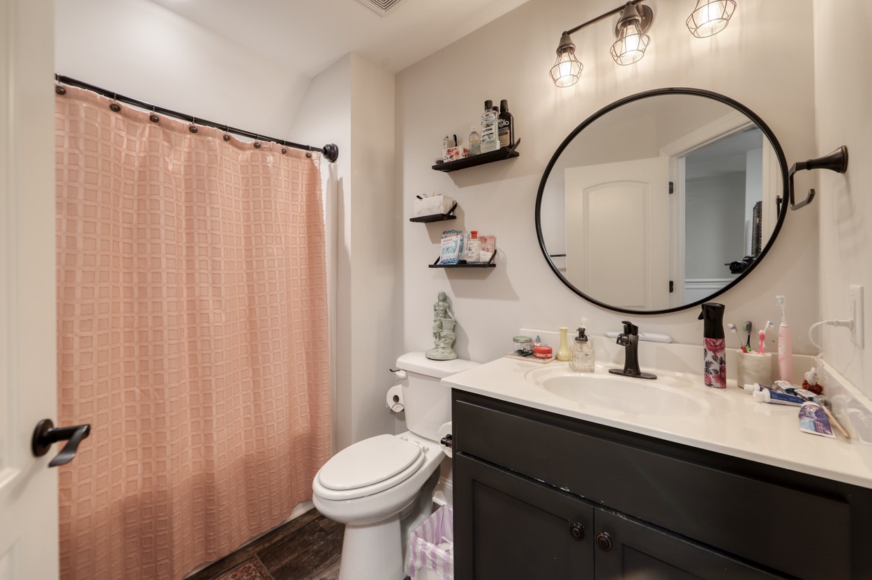 65 Sheltontown Road Manchester, TN 37355 - Photo 28 of 46 a bathroom with a sink and a mirror