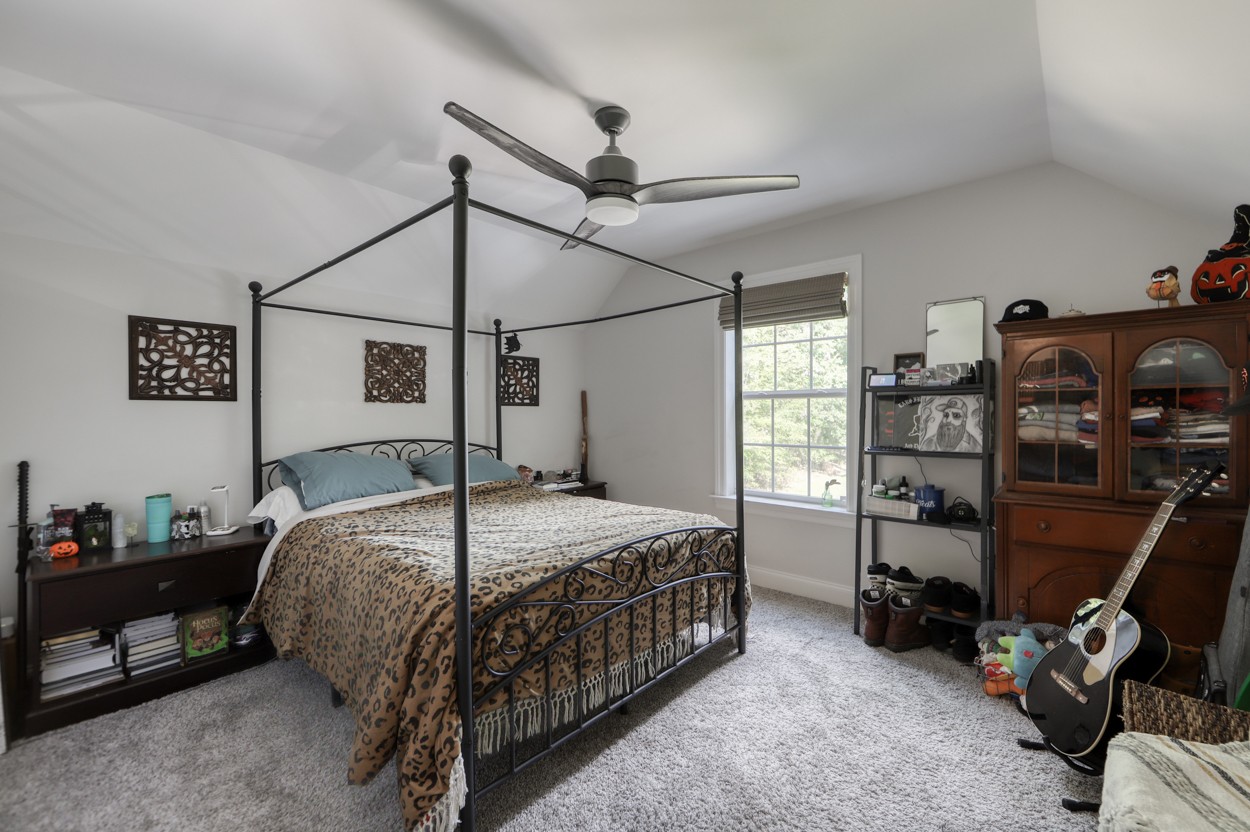 65 Sheltontown Road Manchester, TN 37355 - Photo 29 of 46 a bedroom with a bed a desk and chair