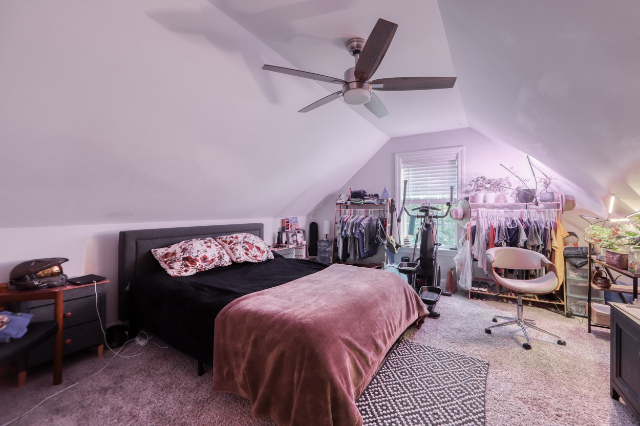 65 Sheltontown Road Manchester, TN 37355 - Photo 30 of 46 a bedroom with a bed a chandelier and chair