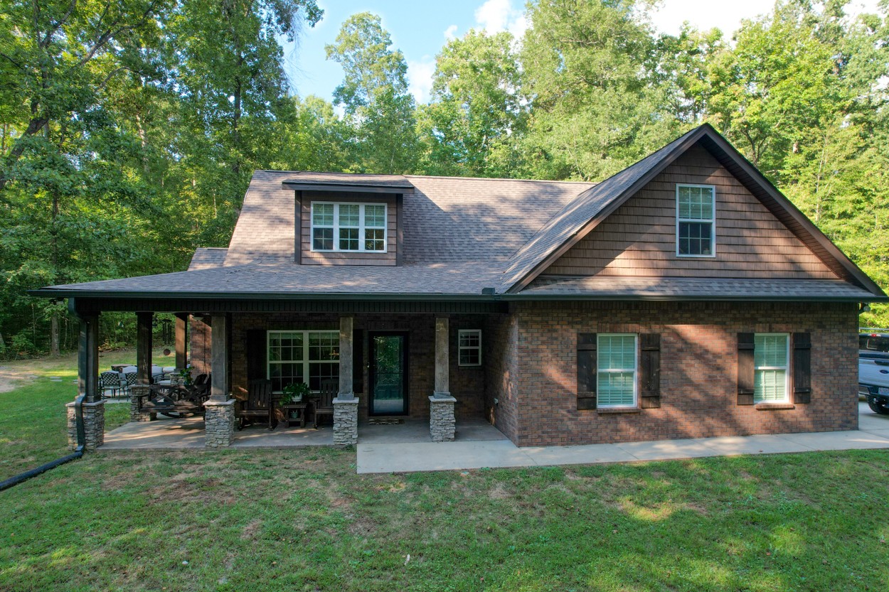 65 Sheltontown Road Manchester, TN 37355 - Photo 4 of 46 a view of a house with a garden