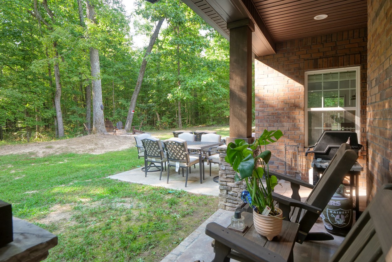 65 Sheltontown Road Manchester, TN 37355 - Photo 38 of 46 a view of a backyard with sitting area
