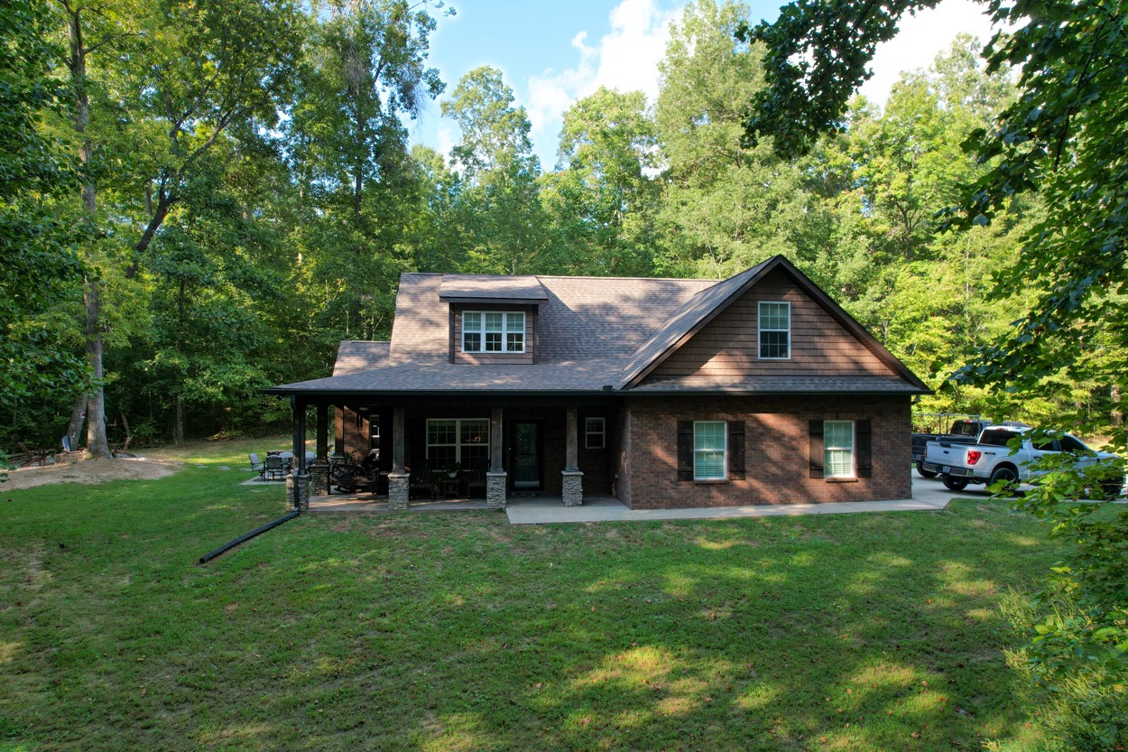 65 Sheltontown Road Manchester, TN 37355 - Photo 5 of 46 a view of a house with a yard porch and sitting area