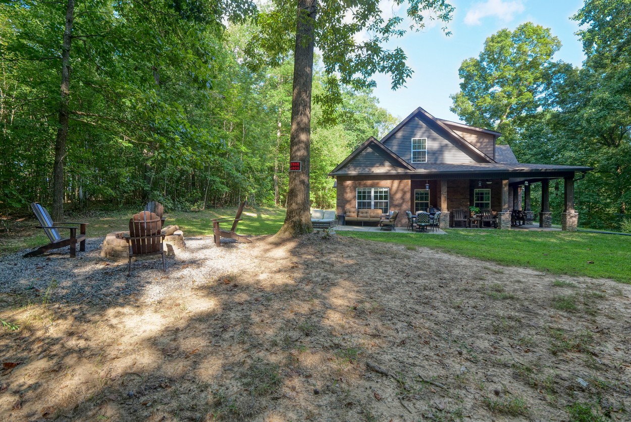 65 Sheltontown Road Manchester, TN 37355 - Photo 43 of 46 a front view of a house with a yard