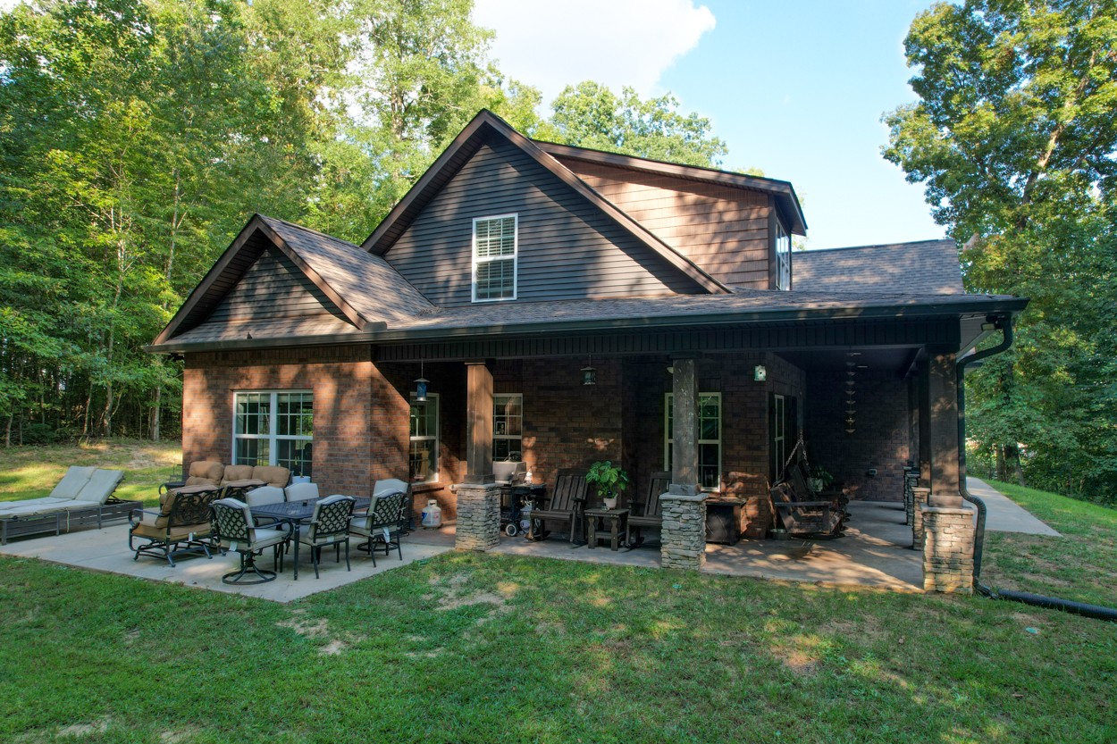 65 Sheltontown Road Manchester, TN 37355 - Photo 6 of 46 a view of a house with sitting area and swimming pool