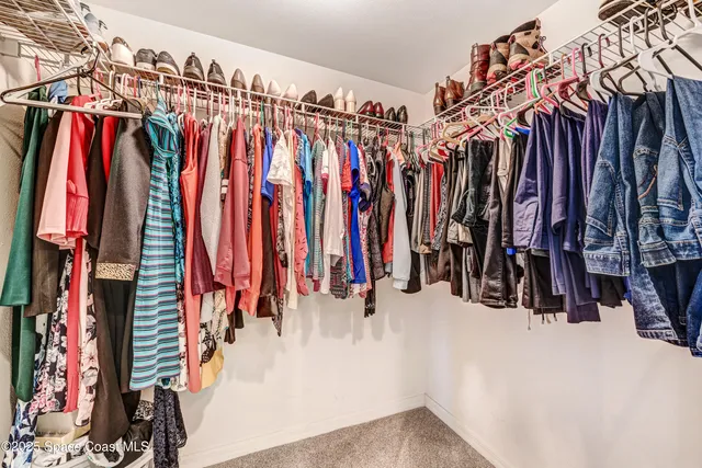 a bathroom with a shower sink and mirror