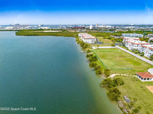 a view of a lake with a houses