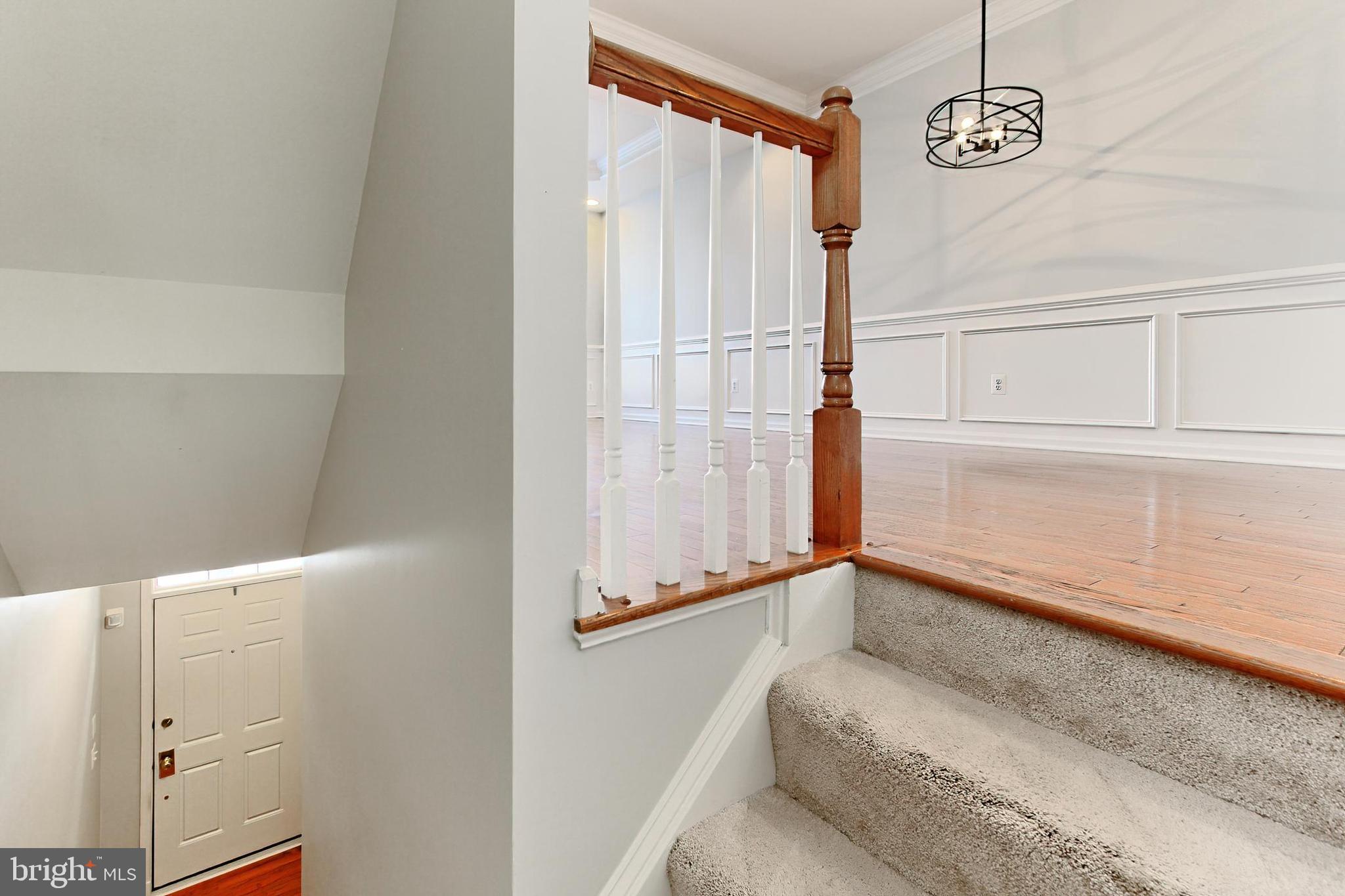 20384 Bass Rocks Terrace Ashburn, VA 20147 - Photo 5 of 44 The main Lvl has Hardwood Flooring