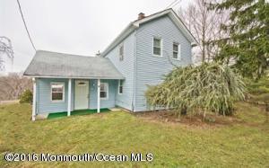 74 Tennent Road Morganville, NJ 07751 - Photo 1 of 8 Front