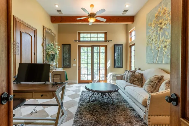 a view of a dining room with furniture wooden floor and chandelier