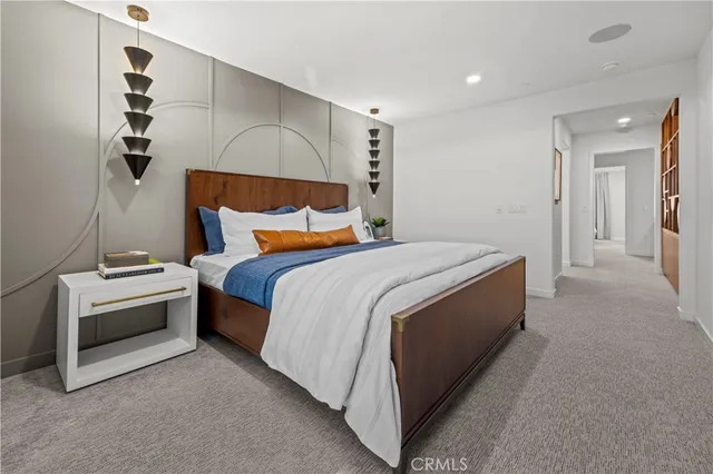 a bed room with a bed and a night stand