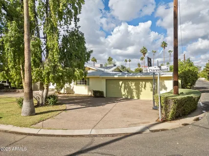 a view of a house with fountain bath tub and fire pit