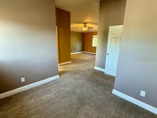 an empty room with a bathroom