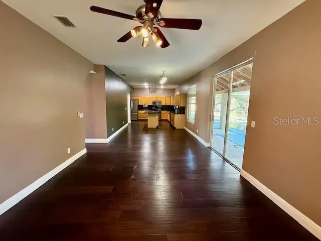 an entryway in a hall with a window