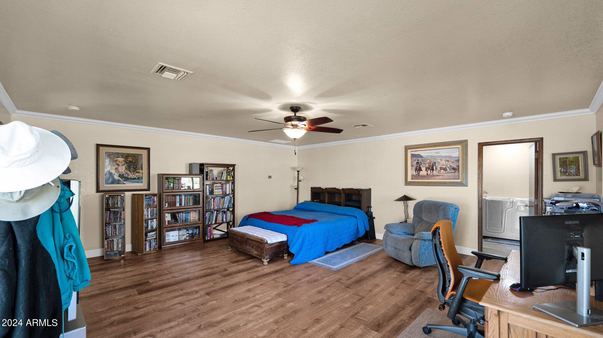 814 East Harwell Road Gilbert, AZ 85234 - Photo 17 of 35 a living room with furniture and a flat screen tv