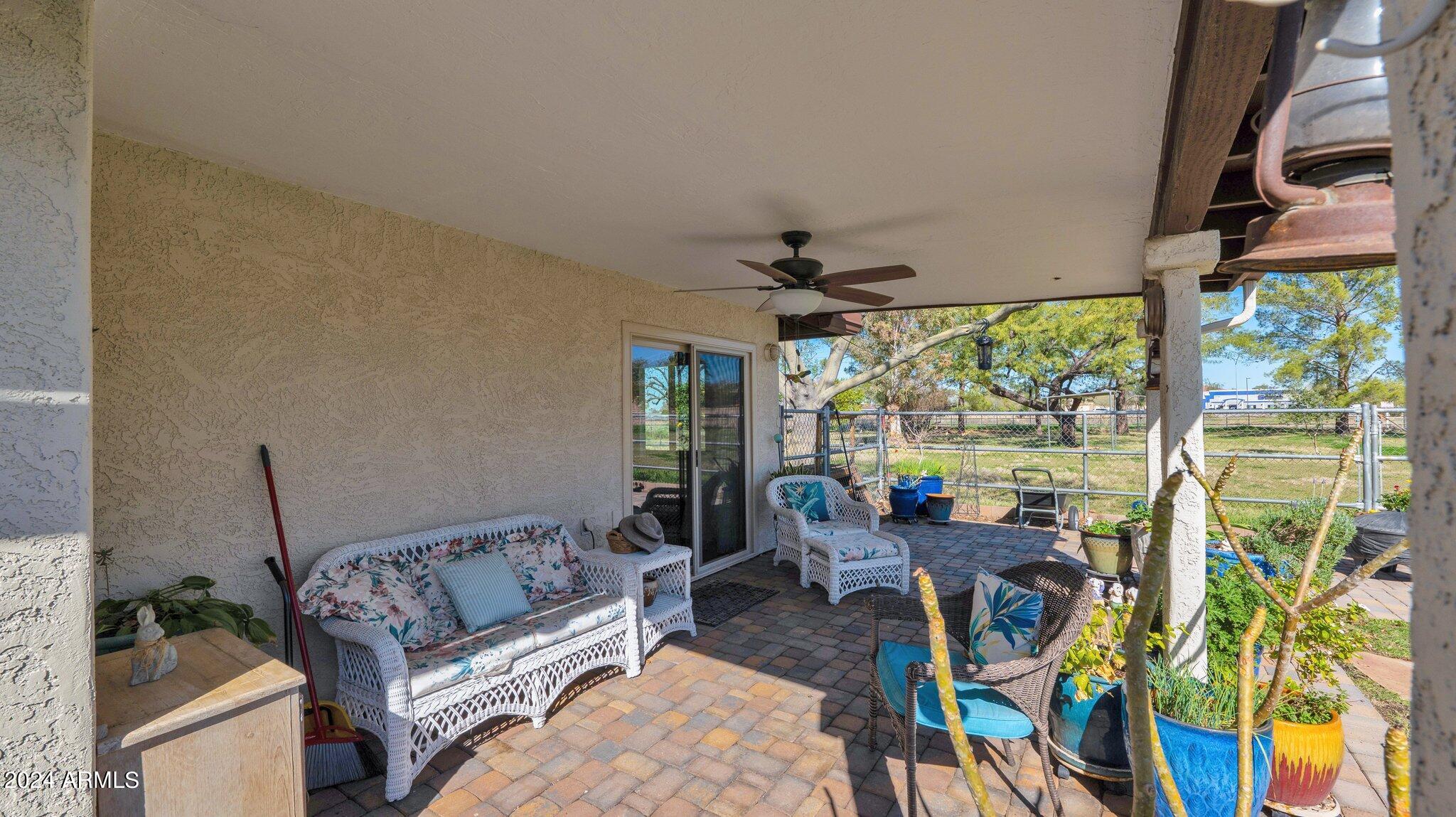 814 East Harwell Road Gilbert, AZ 85234 - Photo 27 of 35 a living room with furniture and a large window
