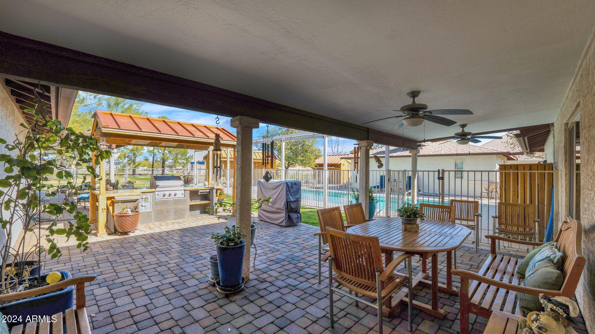 814 East Harwell Road Gilbert, AZ 85234 - Photo 5 of 35 a view of a dining room with furniture window and outside view
