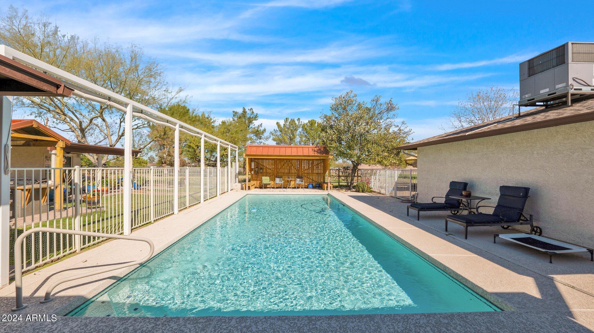 814 East Harwell Road Gilbert, AZ 85234 - Photo 6 of 35 a view of a house with backyard and sitting area
