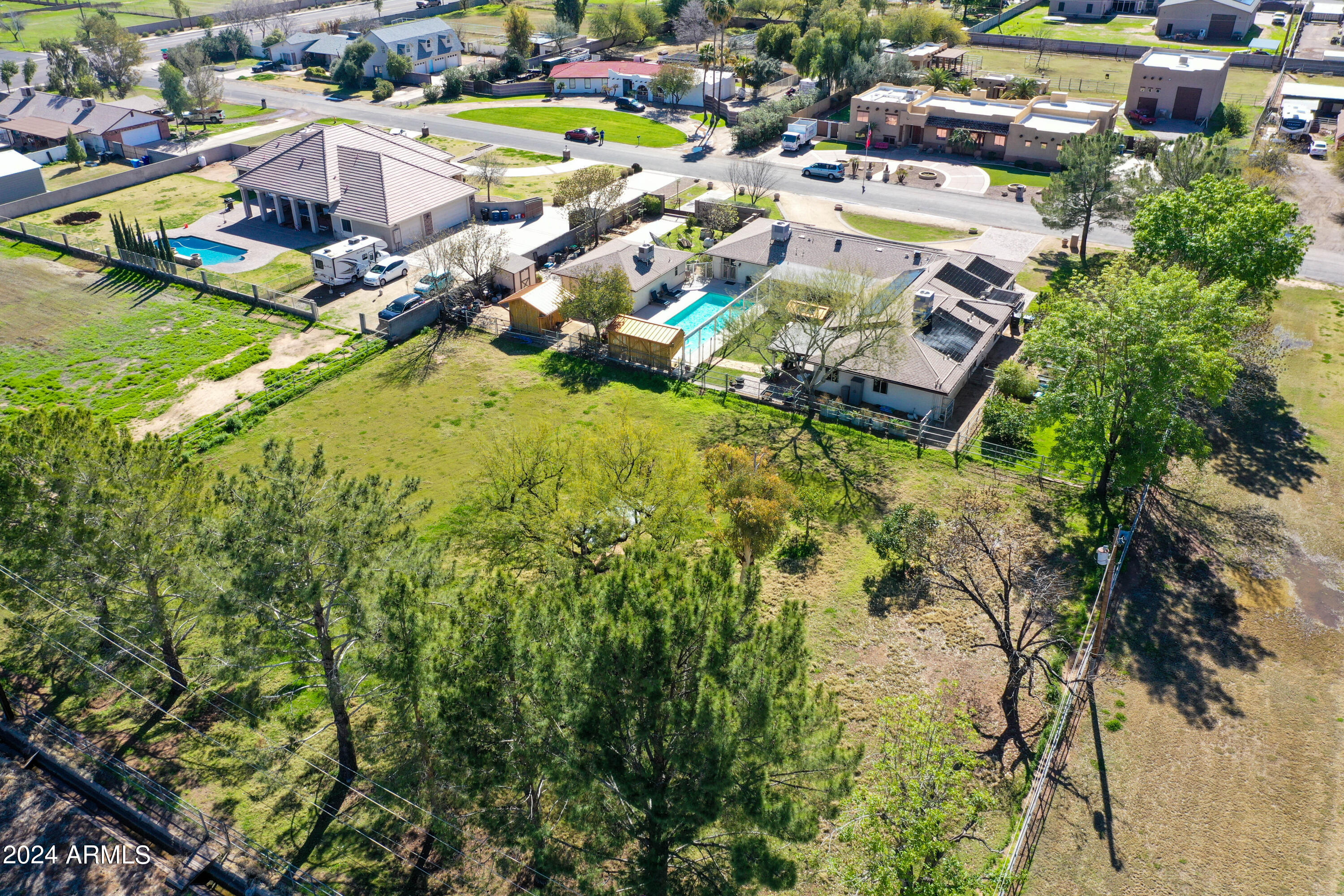 814 East Harwell Road Gilbert, AZ 85234 - Photo 9 of 35 a aerial view of residential houses with swimming pool
