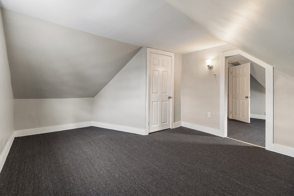 43 Wait Street Springfield, MA 01104 - Photo 13 of 18 a view of an empty room with a window