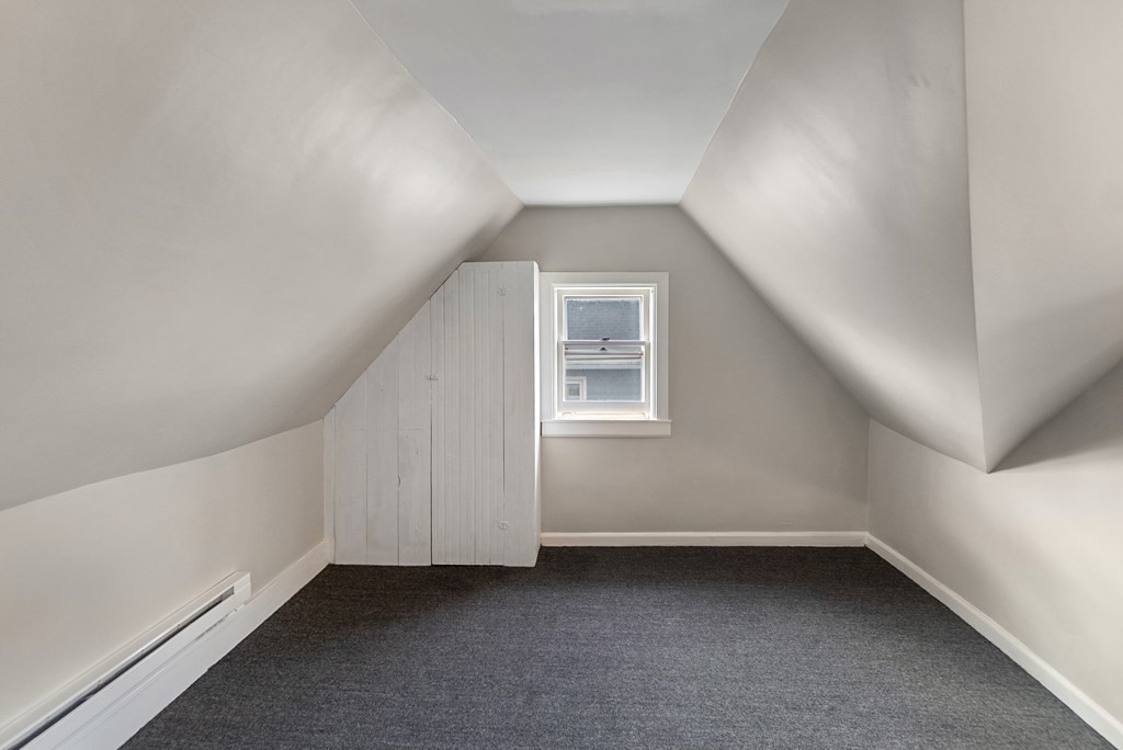 43 Wait Street Springfield, MA 01104 - Photo 15 of 18 a view of a small space with closet and a window