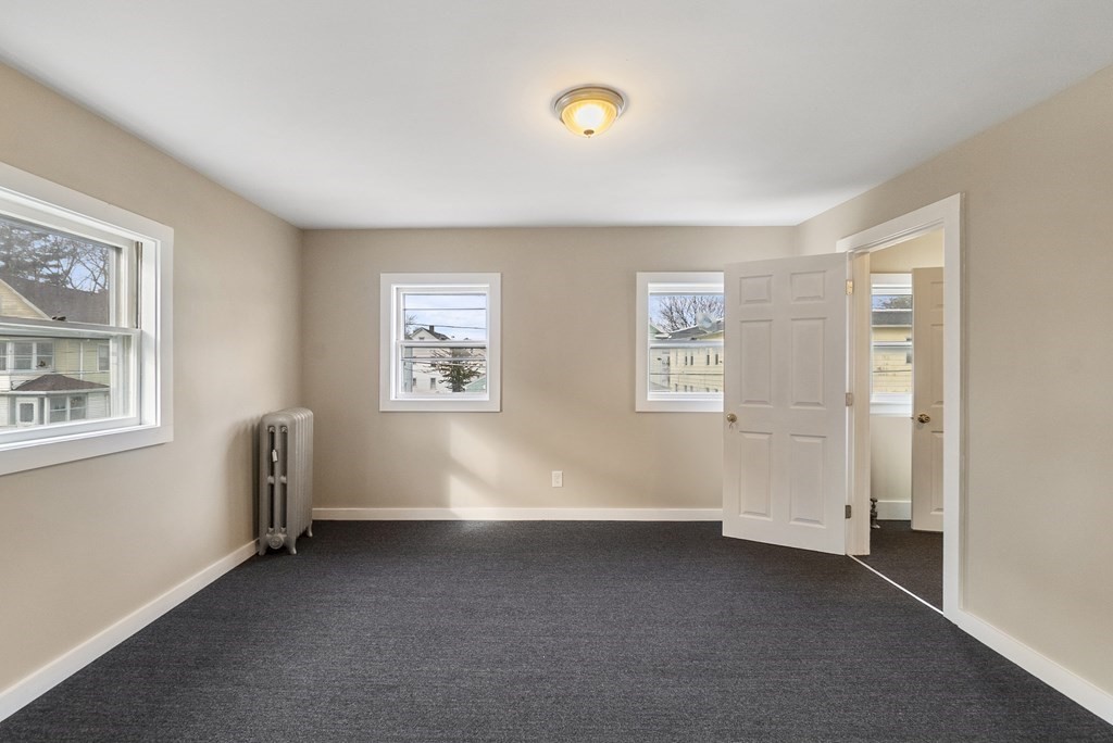 43 Wait Street Springfield, MA 01104 - Photo 7 of 18 a view of room with window and workspace