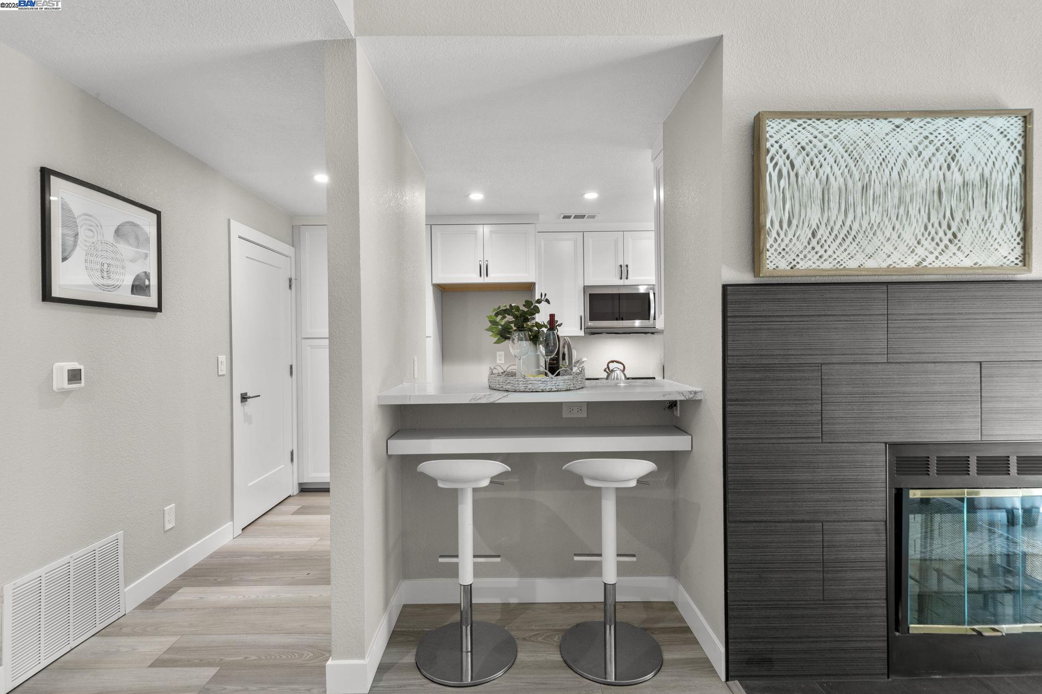 8170 Mountain View Drive, Unit F Pleasanton, CA 94588 - Photo 14 of 51 a kitchen with a sink cabinets and window
