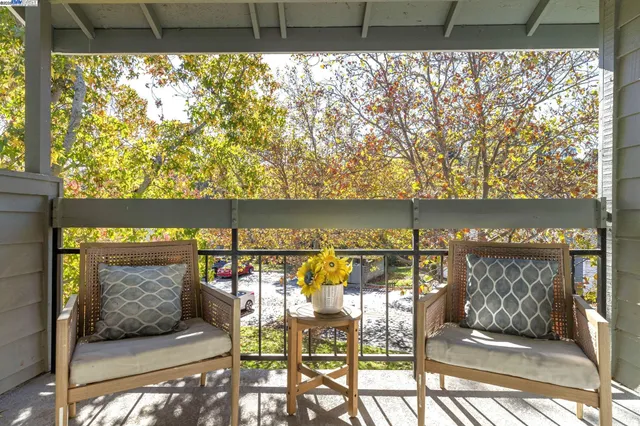 a view of swimming pool from a balcony