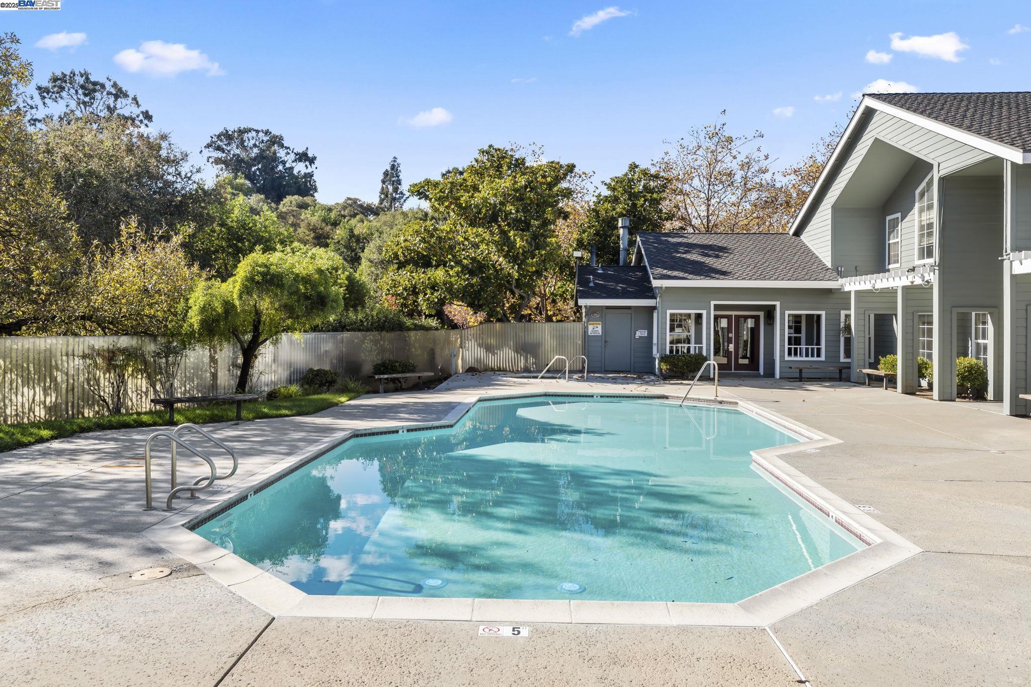 8170 Mountain View Drive, Unit F Pleasanton, CA 94588 - Photo 45 of 51 a view of a house with a yard