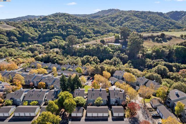 an aerial view of residential house and outdoor space