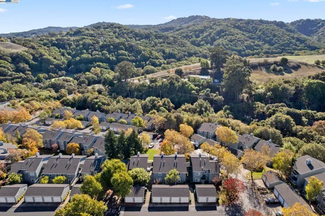 an aerial view of residential house and outdoor space