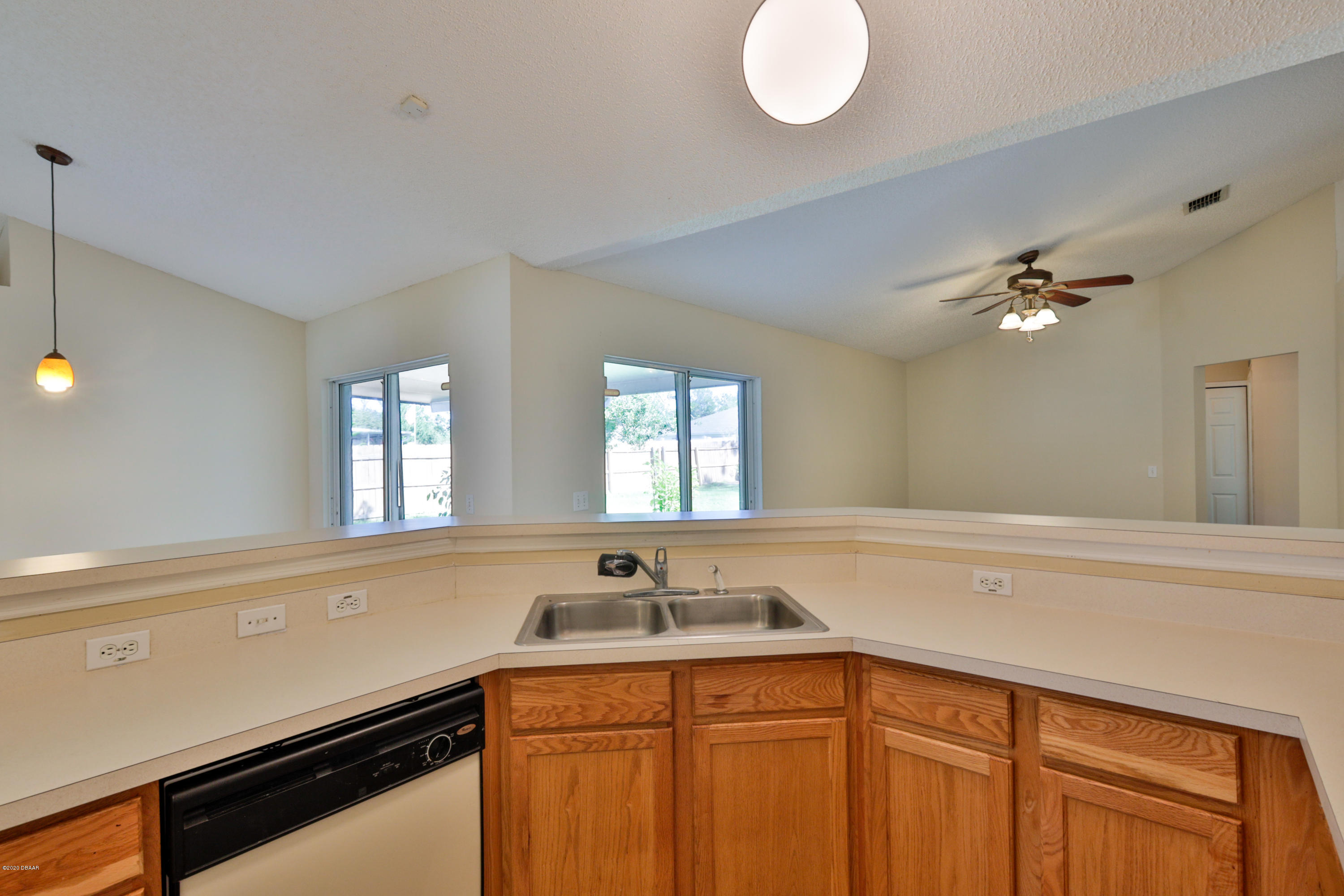 17 Rocking Lane Palm Coast, FL 32164 - Photo 11 of 33 Kitchen to Family & Dining Room