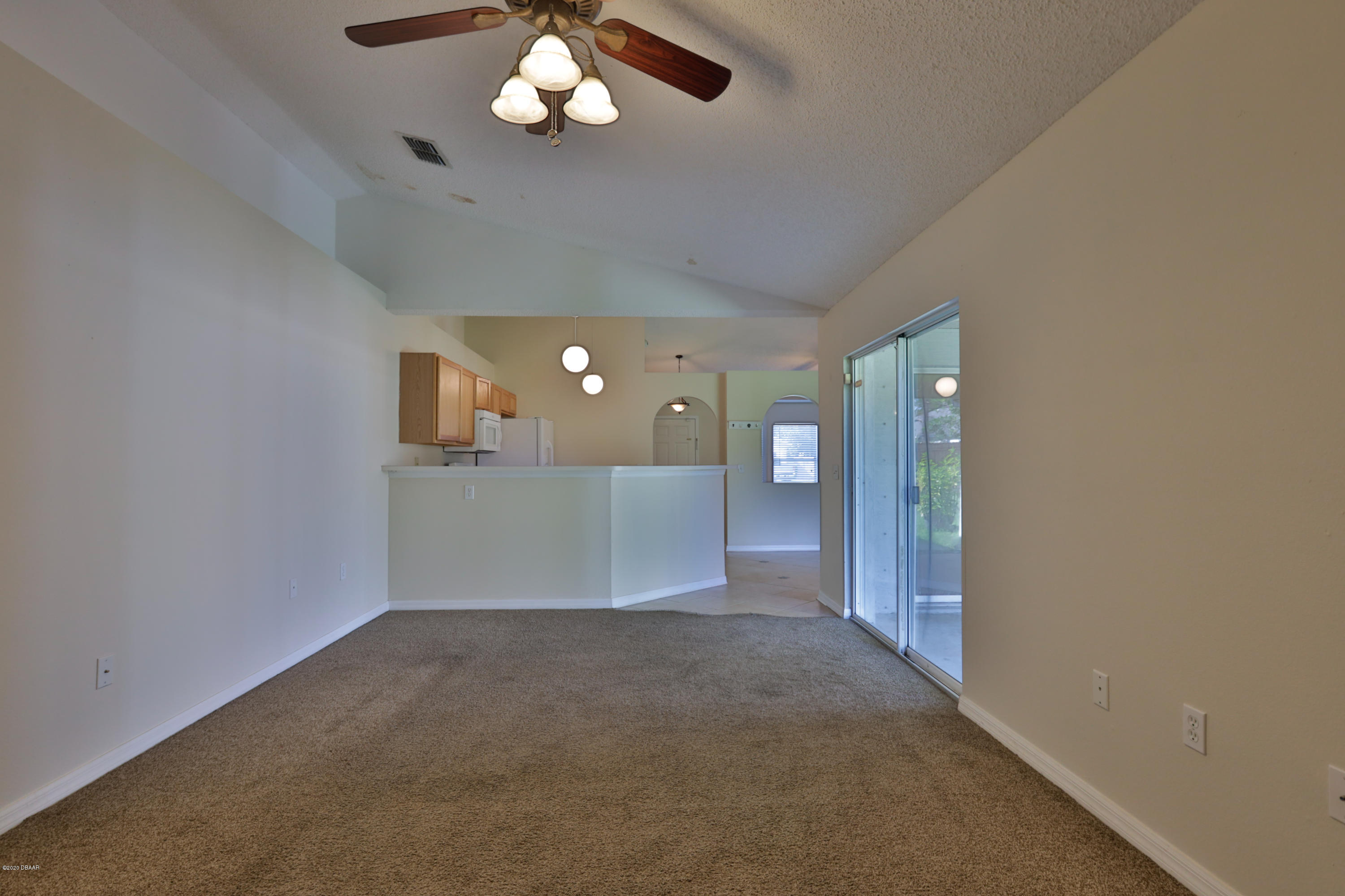17 Rocking Lane Palm Coast, FL 32164 - Photo 13 of 33 Family Room to Kitchen