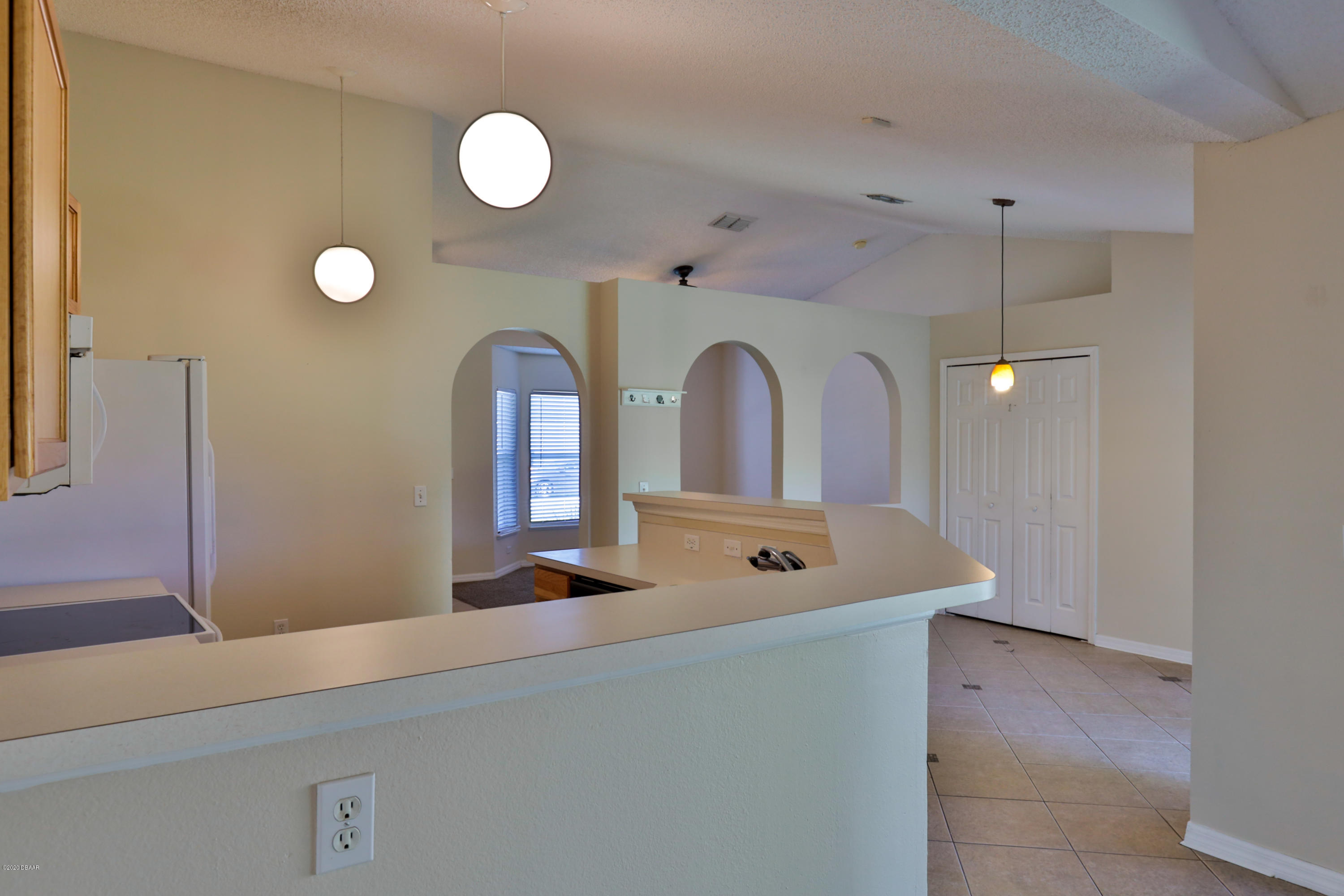 17 Rocking Lane Palm Coast, FL 32164 - Photo 6 of 33 Kitchen & Dining Area