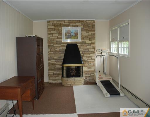 5 Chandler Road Edison, NJ 08820 - Photo 18 of 23 a view of livingroom with furniture and window