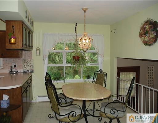5 Chandler Road Edison, NJ 08820 - Photo 7 of 23 a view of a dining room with furniture window and outside view