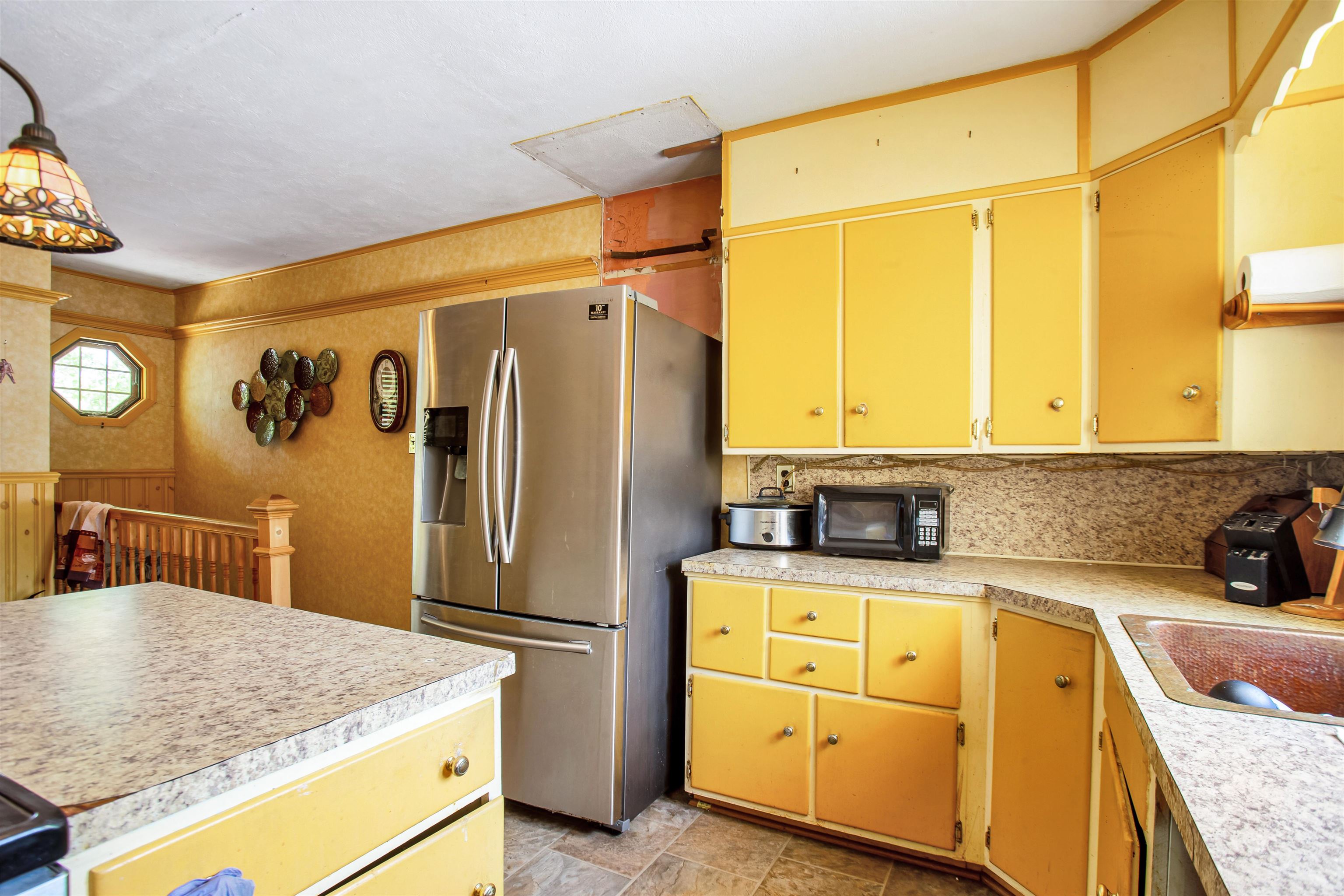 210 South Railroad Avenue Rio Grande, NJ 08242 - Photo 8 of 36 a kitchen with stainless steel appliances granite countertop a sink refrigerator and cabinets