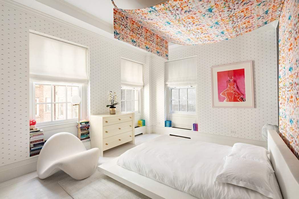 823 Park Avenue, Unit 4 Manhattan, NY 10021 - Photo 11 of 14 a bed room with a bed and furniture