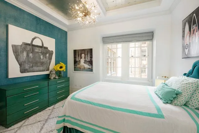 a bathroom with a sink vanity tub and shower