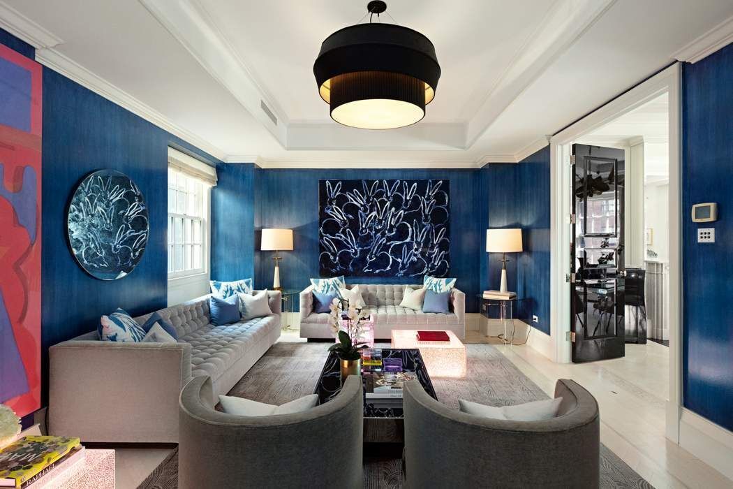 823 Park Avenue, Unit 4 Manhattan, NY 10021 - Photo 4 of 14 a living room with furniture and a large window