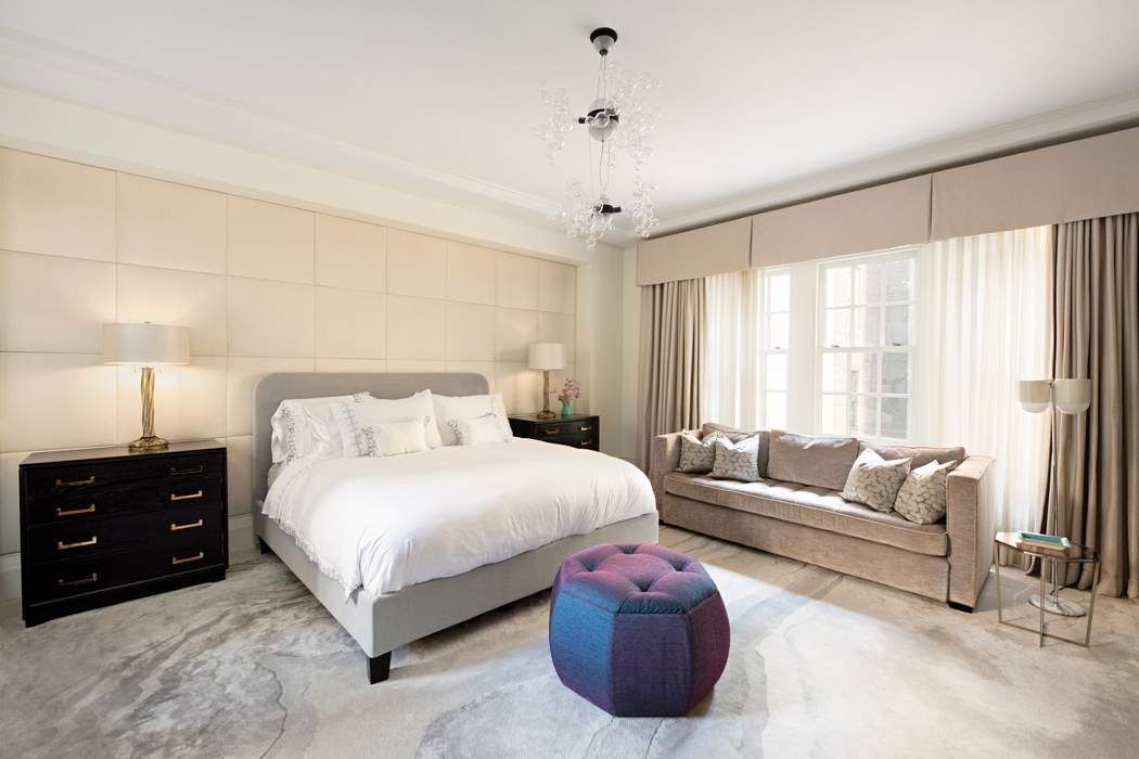 823 Park Avenue, Unit 4 Manhattan, NY 10021 - Photo 7 of 14 a bedroom with a bed and a couch