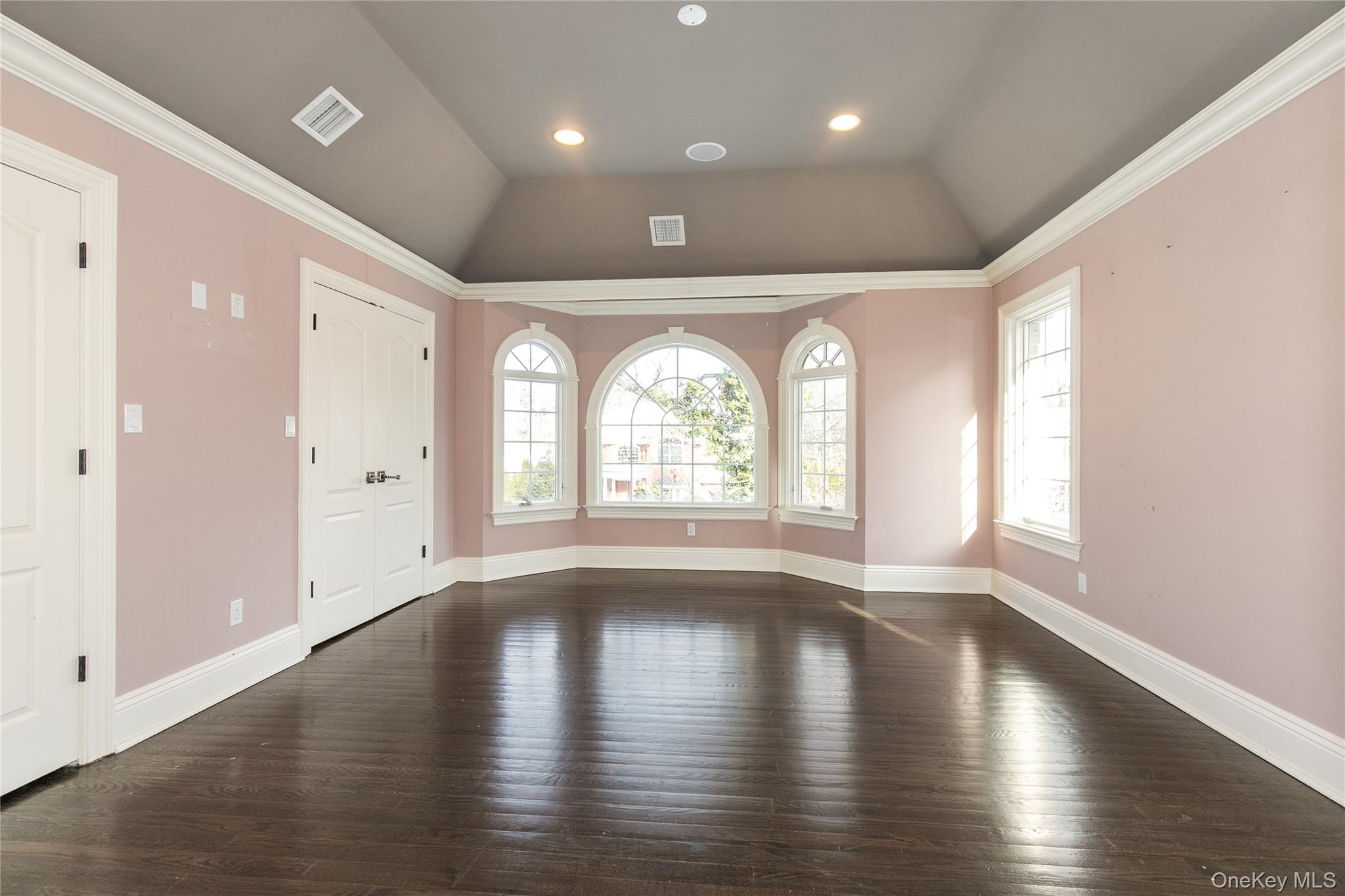 12 Knollwood Road Roslyn, NY 11576 - Photo 30 of 41 an empty room with wooden floor and window
